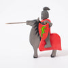 Toy horse and knight in black & red with green dragon on shield | © Conscious Craft